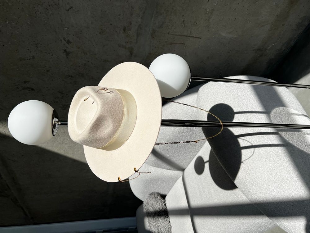 Women's felt fedora hat with decor and chain, beige