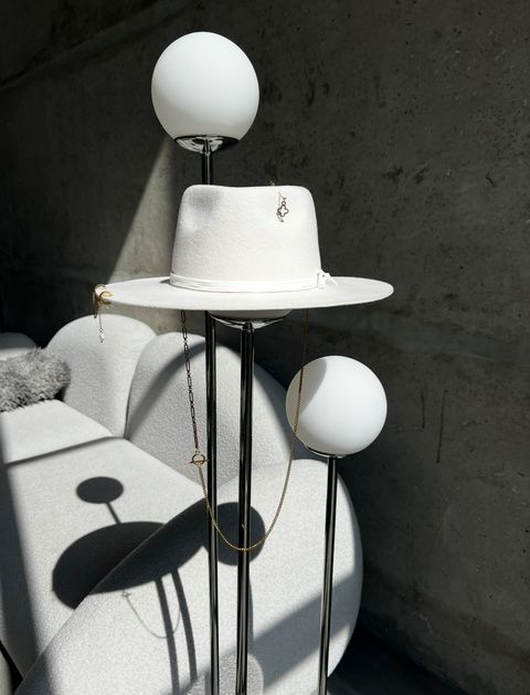 Women's felt fedora hat with decor and chain, white