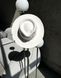 Women's felt fedora hat with decor and chain, white