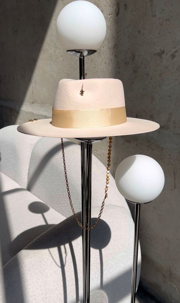 Women's felt fedora hat with decor and chain, beige