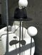 Women's felt fedora hat with decor and chain, black with 7 cm brim