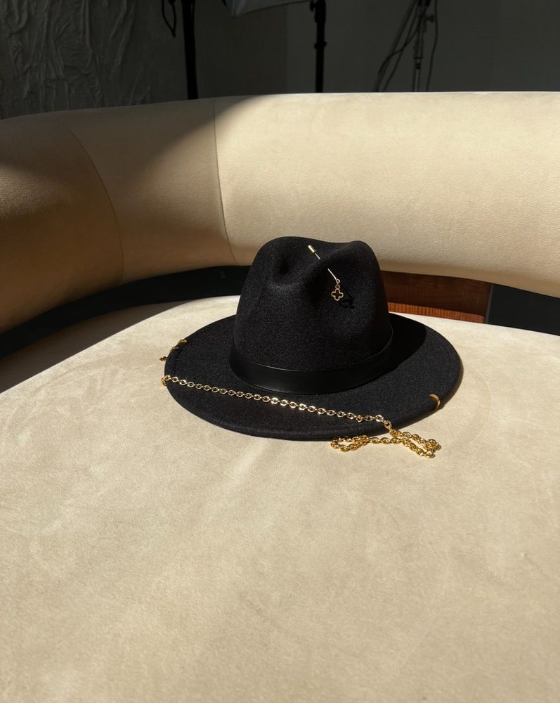 Women's felt fedora hat with decor and chain, black with 7 cm brim