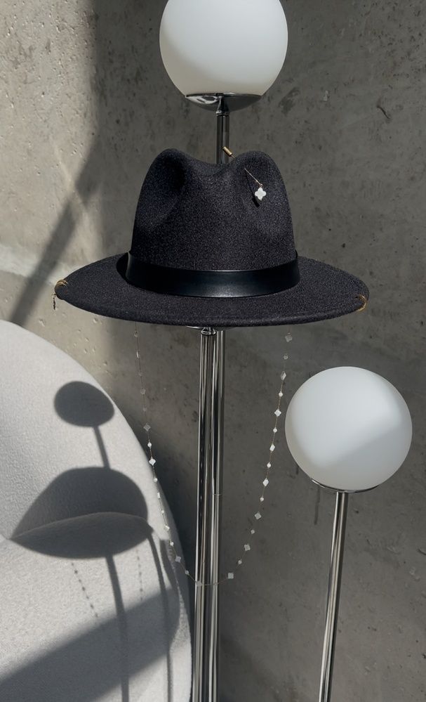 Women's felt fedora hat with decor and chain, black with 7 cm brim