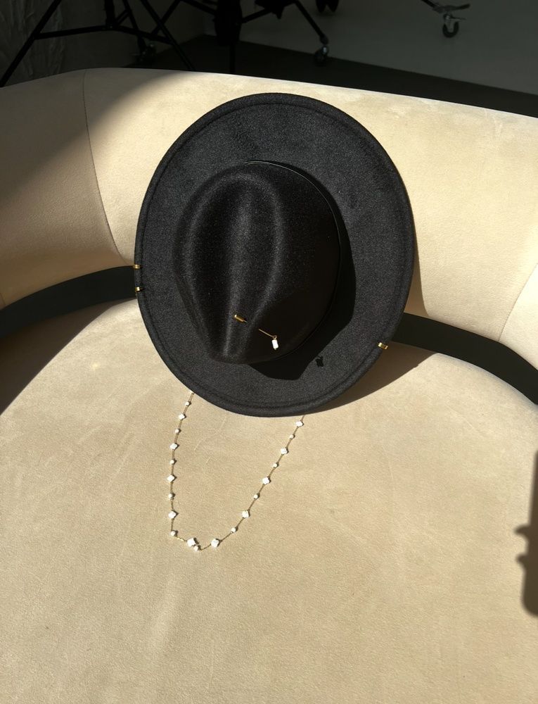 Women's felt fedora hat with decor and chain, black with 7 cm brim