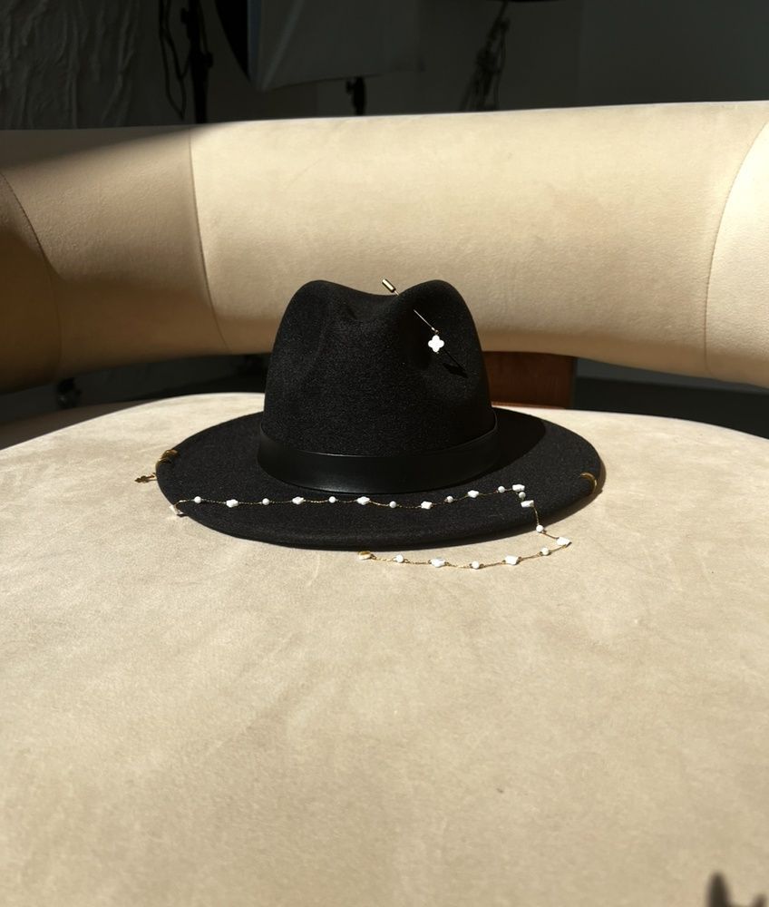 Women's felt fedora hat with decor and chain, black with 7 cm brim