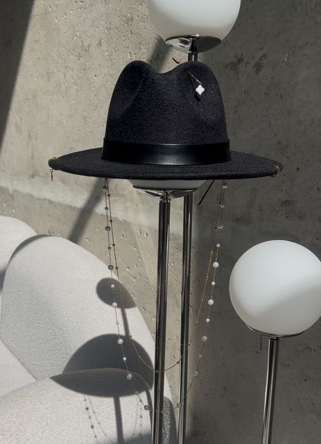 Women's felt fedora hat with decor and chain, black with 7 cm brim