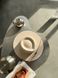 Women's felt fedora hat with decor and chain, beige
